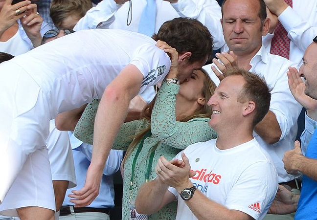 Andy Murray kisses his wife Kim Sears after winning Wimbledon championship