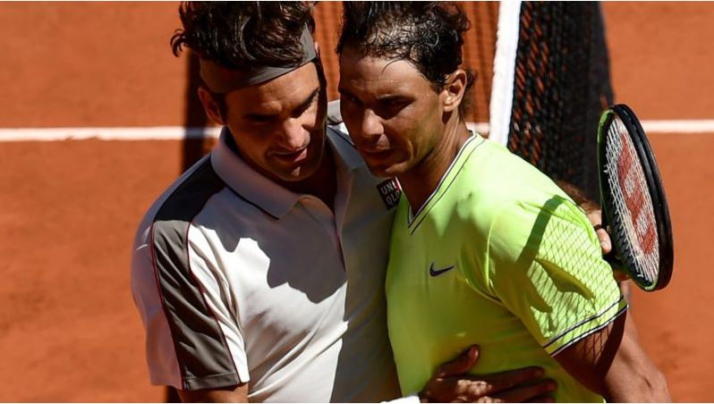 Federer hug Rafael Nadal