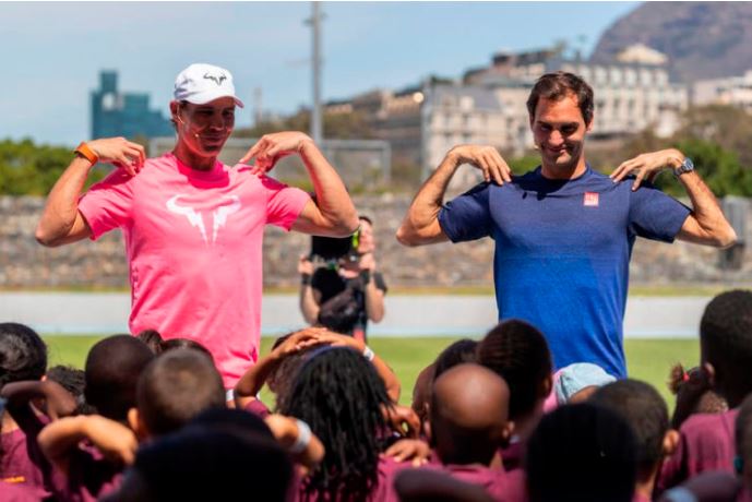 Rafael Nadal and Roger Federer exercise