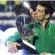 Novak Djokovic kiss trophy