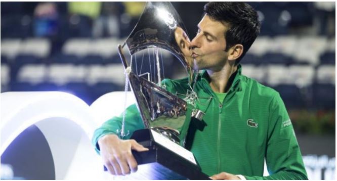 Novak Djokovic kiss trophy