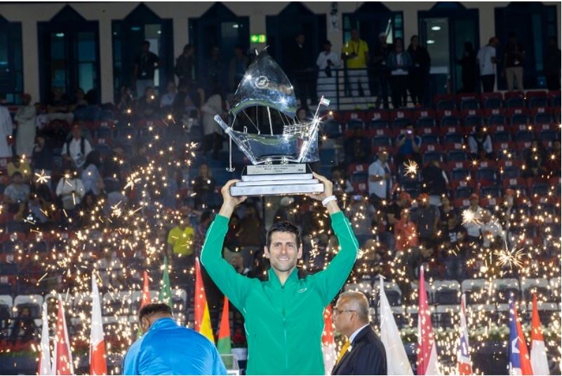 Novak Djokovic raise trophy