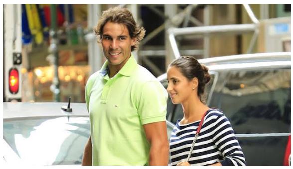 Rafael Nadal and wife walk