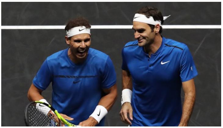 Roger Federer and Rafael Nadal smiling