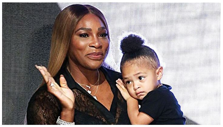 Serena Williams carry daughter