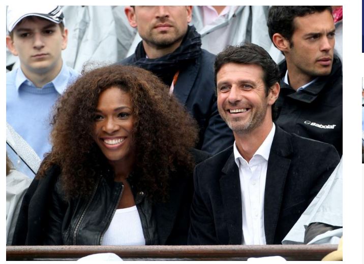 Serena Williams and coach smile