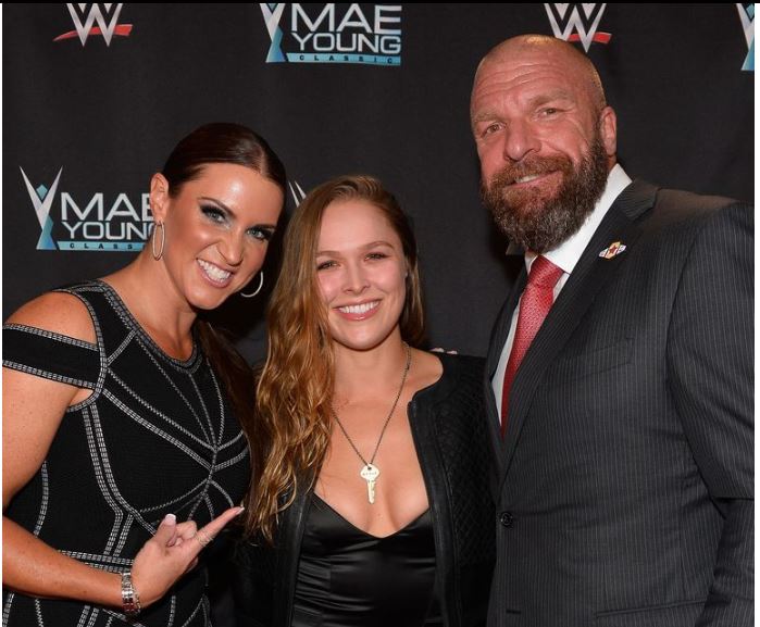 Triple H , Stephanie and Ronda Rousey