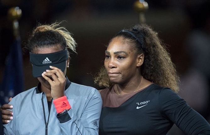 Naomi Osaka consoled by Serena Williams