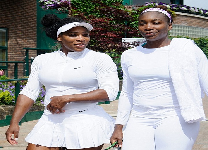 Venus and Serena Williams on white