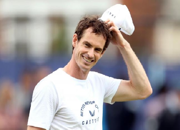 Andy Murray smiles to