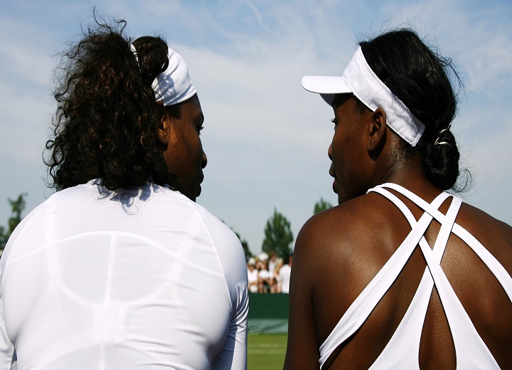 Serena Williams and Venus white on court