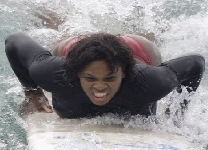 Serena Williams catches some waves in a pair of ill fitting bikini bottoms