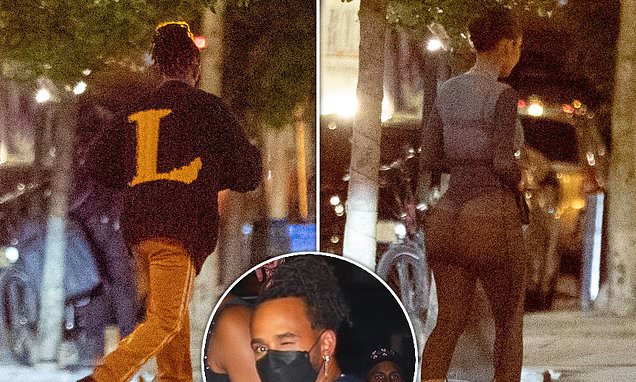 Lewis Hamilton returns to his hotel with a mystery woman after attending the Met Gala afterparty in NYC