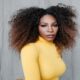 Serena Williams busts a move yellow dress