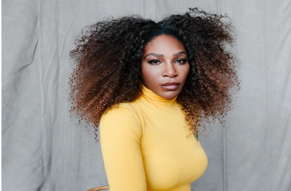 Serena Williams busts a move yellow dress