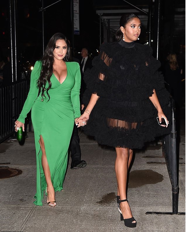 Vanessa Bryant flaunts cleavage in green gown