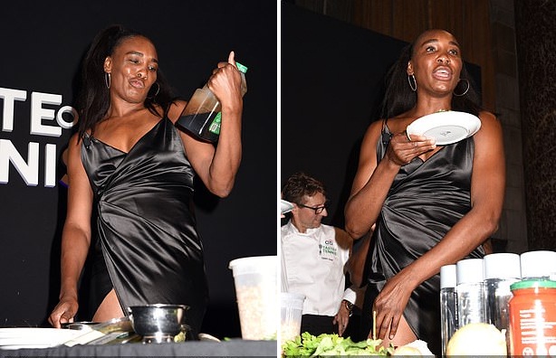 Having fun: Venus looked sensational as she opted to go braless in her plunging black frock, with her athletic physique on full display
