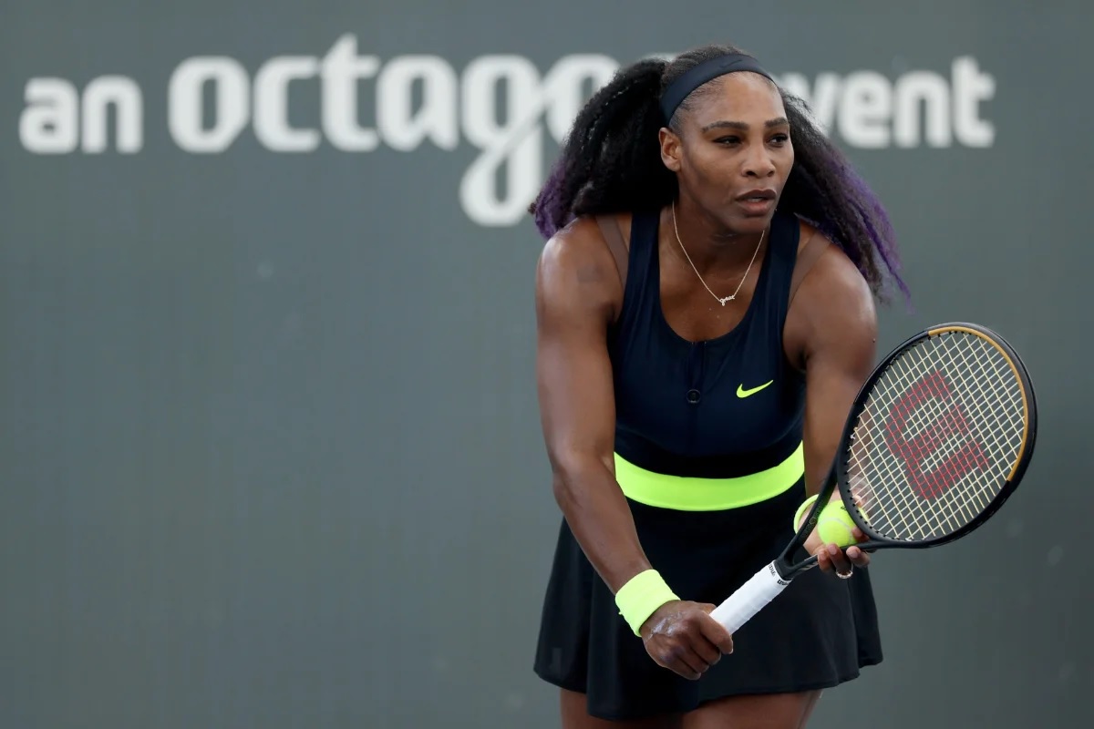 Serena Williams serves during her match against Venus Williams during Top Seed Open
