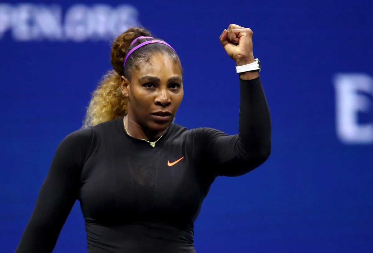 Serena Williams of the United States celebrates defeating Catherine McNally of the United States during their Women's Singles second round match