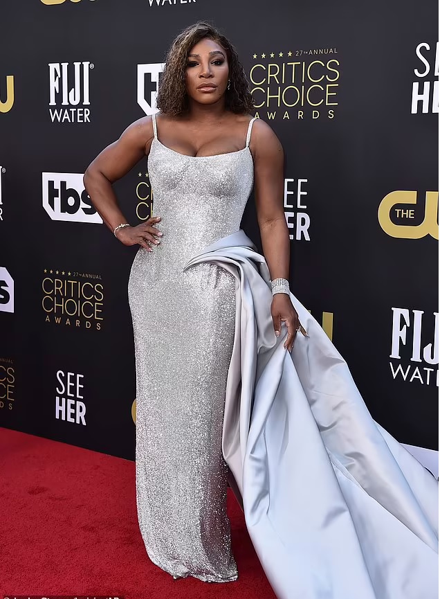  Serena Williams' dazzling floor-length creation - which perfectly highlighted her toned arms - featured a beautiful long train