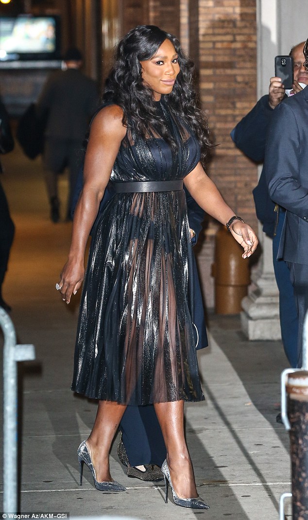 Serena Williams showcased her amazing figure in a semi-sheer gown as she walked the red carpet at the 2015 Glamour Women Of The Year Awards in New York City on Monday evening