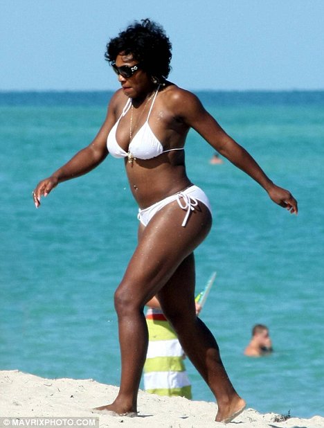 Serena Williams chills out on the beach in a white hot bikini amazing
