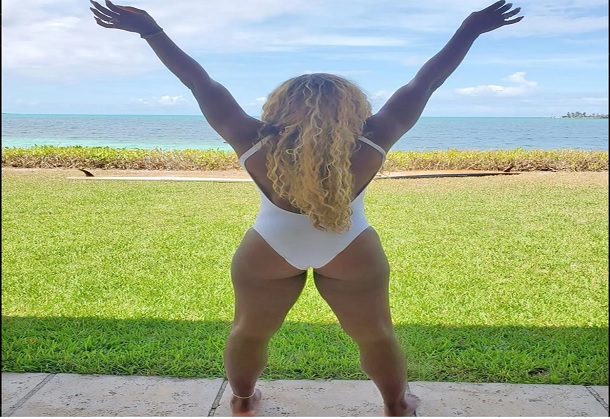 Serena Williams flaunts her fabulously shapely figure in a teeny bikini as she relaxes on a yacht